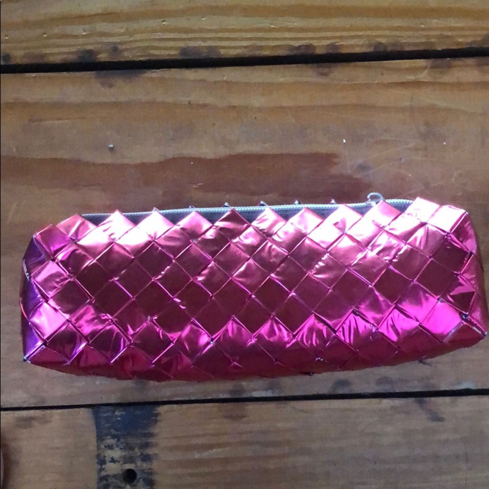 Nahum Ollin Pink shiny makeup bag